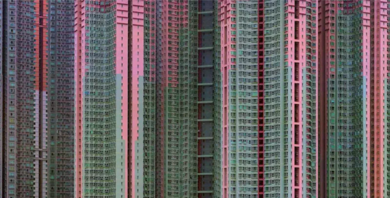 Several densely spaced, high-rise apartment buildings in an urban neighborhood.